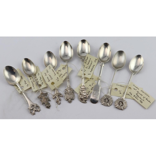 608 - Military interest. A collection of eight silver souvenir military teaspoons, circa 1900s-1930s, incl... 