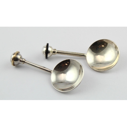 733 - Two Modernist Arts & Crafts style silver Orbit caddy spoons both marked MJP 925 with the Birmingham ... 