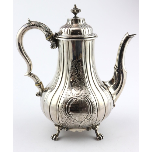 746 - Victorian silver coffee pot which stands on four feet, has two attractive family armorials (comes wi... 