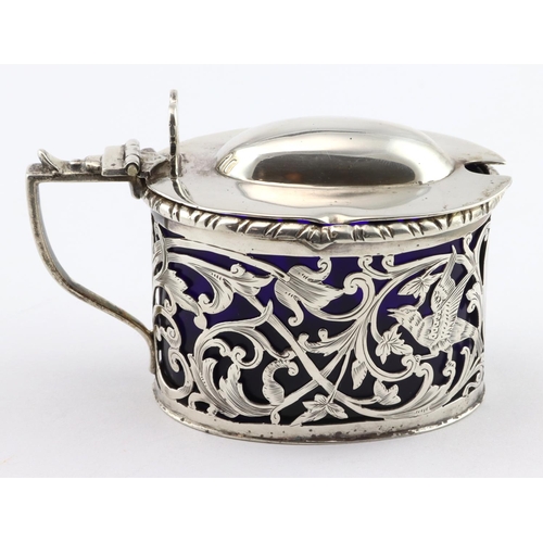 747 - Victorian silver mustard pot, very attractively decorated, with blue liner, the cut-out design shows... 