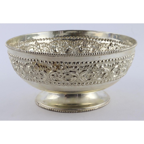 752 - White metal fruit bowl on pedestal base, with ornate decocation to sides, stamped 'Silver to base', ... 