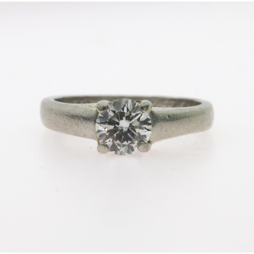 78 - Platinum diamond solitaire ring with a round brilliant cut diamond with certificate stating diamond ... 