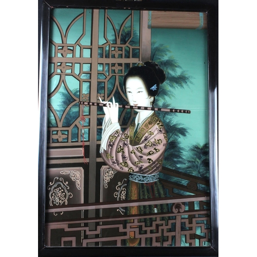 793 - Chinese interest. A large Chinese reverse painting on glass, depicting a female figure playing the f... 