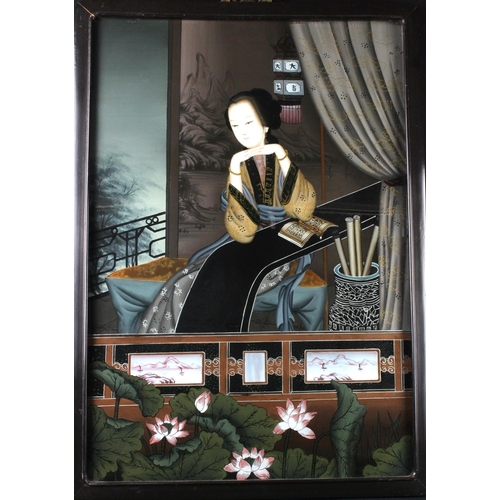 794 - Chinese interest. A large Chinese reverse painting on glass, depicting a female figure reading / stu... 