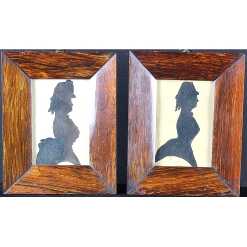 834 - Pair of Regency silhouette profile portraits. Possibly both of the same sitter. One being referenced... 