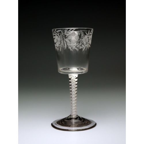 871 - 18th century Georgian wine glass. With a spiral air twist stem and engraved with a floral design to ... 