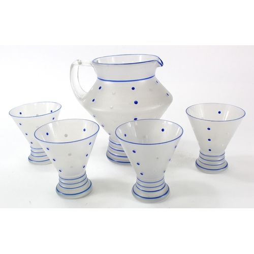 914 - Lemonade set, comprising jug and four glasses with a blue and white spotted design, circa mid 20th C... 