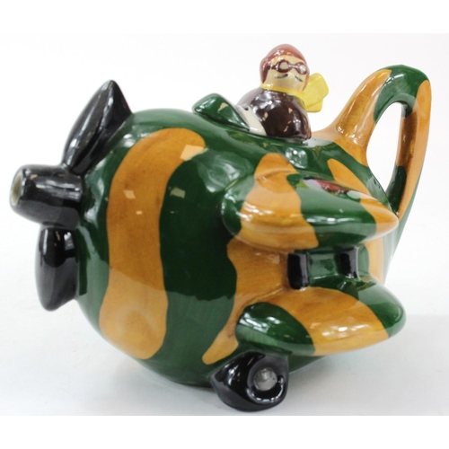 989 - Teapots. Four novelty teapots, consisting three biplanes with pilots by Carlton Ware & a humpty dump... 