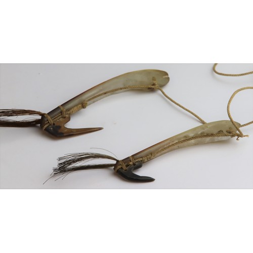 1065 - Tribal/Oceanic interest- Two  fish hooks, probably from the Banaba islands, made from pearl and turt... 