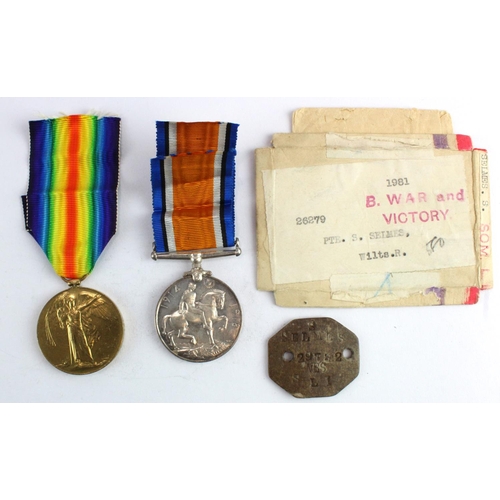 1113 - BWM & Victory Medals & dog tag & box 26279 Pte S Selmes Wilts R (and 29732 SLI on dog tag).    (2)