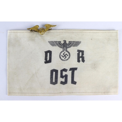 603 - German Nazi Armband German railways east dated 1943 with small badge.