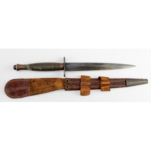 67 - Commando Dagger, ribbed grip, leather scabbard, no makers marks