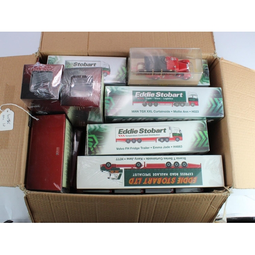 71 - Diecast. Twelve boxed Eddie Stobart  models by Atlas editions, together with four boxed fire engines... 