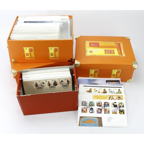 451 - GB FDC collection housed in 4x orange boxes, virtually complete with Commems, Defins and Panes, as s... 