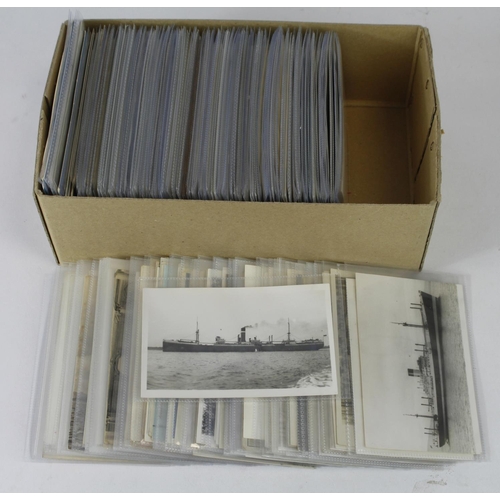 573 - Shipping interest - a packed shoebox of postcards and a large amount of 