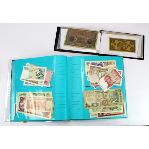 1218 - World (430+), a collection in photo album, some duplication, mixed grades including Uncirculated, pl... 