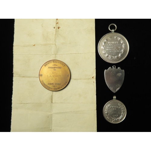 2206 - Railway Interest: Four medals: Southern Railway Servants' Orphanage hallmarked silver medal 'Awarded... 