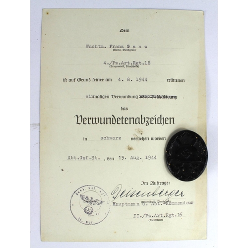 496 - German WW2 Wound badge in black with award document to Franz Ganz . 4 /pz .aart. rgt . 16.