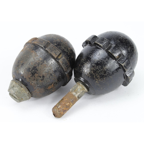 505 - WW1 German egg grenades, one with fuse the other with filling plug, deactivated.