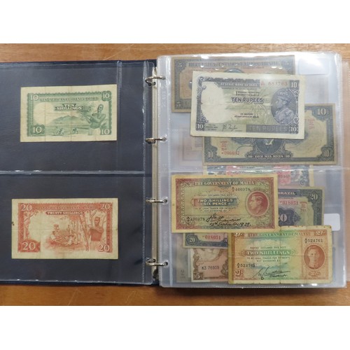 1203 - World (175), a collection in album including British West Africa, India, Malta,East African Currency... 