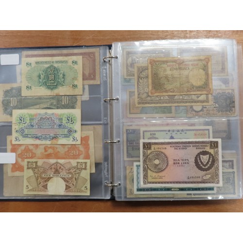 1203 - World (175), a collection in album including British West Africa, India, Malta,East African Currency... 