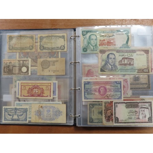 1203 - World (175), a collection in album including British West Africa, India, Malta,East African Currency... 