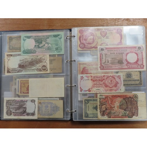 1203 - World (175), a collection in album including British West Africa, India, Malta,East African Currency... 