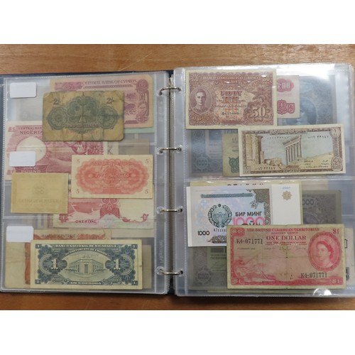 1203 - World (175), a collection in album including British West Africa, India, Malta,East African Currency... 