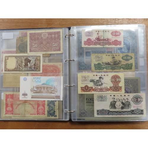 1203 - World (175), a collection in album including British West Africa, India, Malta,East African Currency... 