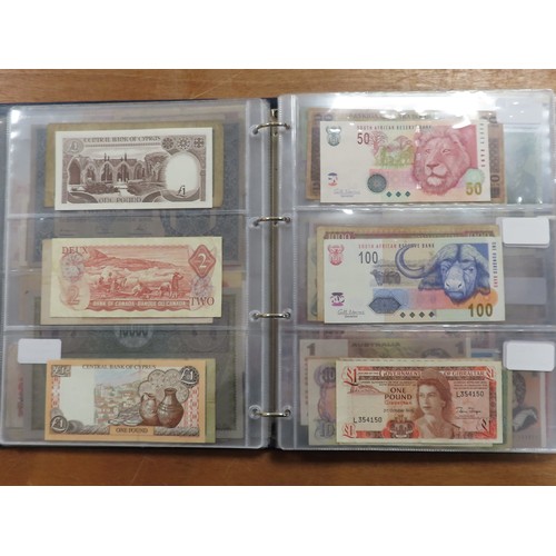 1203 - World (175), a collection in album including British West Africa, India, Malta,East African Currency... 