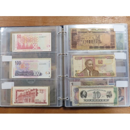 1203 - World (175), a collection in album including British West Africa, India, Malta,East African Currency... 