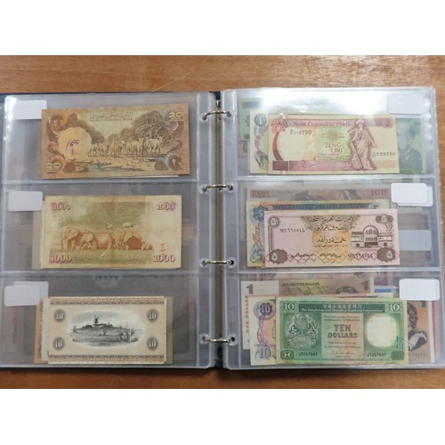 1203 - World (175), a collection in album including British West Africa, India, Malta,East African Currency... 