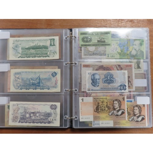 1203 - World (175), a collection in album including British West Africa, India, Malta,East African Currency... 