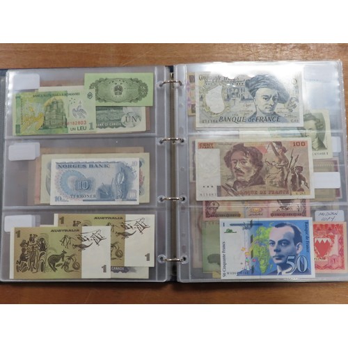 1203 - World (175), a collection in album including British West Africa, India, Malta,East African Currency... 