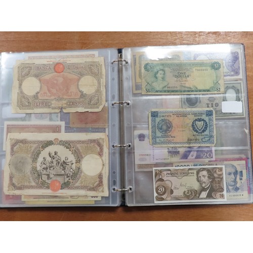 1203 - World (175), a collection in album including British West Africa, India, Malta,East African Currency... 