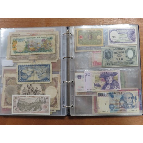 1203 - World (175), a collection in album including British West Africa, India, Malta,East African Currency... 