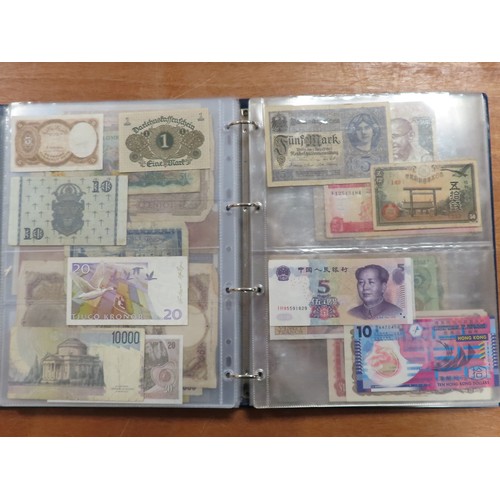 1203 - World (175), a collection in album including British West Africa, India, Malta,East African Currency... 