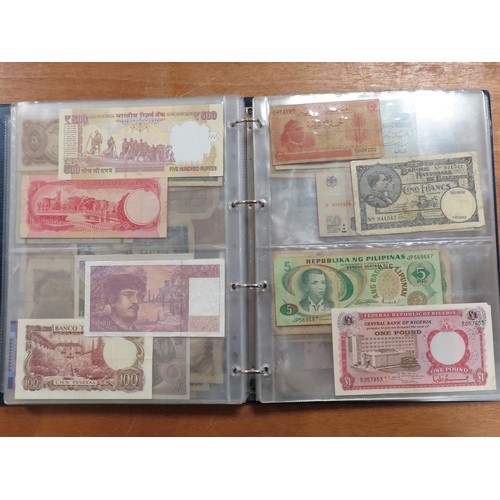 1203 - World (175), a collection in album including British West Africa, India, Malta,East African Currency... 