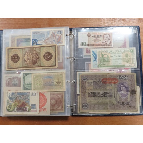 1203 - World (175), a collection in album including British West Africa, India, Malta,East African Currency... 