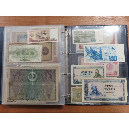 1203 - World (175), a collection in album including British West Africa, India, Malta,East African Currency... 