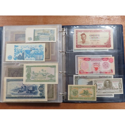 1203 - World (175), a collection in album including British West Africa, India, Malta,East African Currency... 