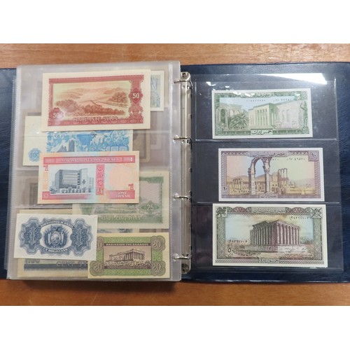 1203 - World (175), a collection in album including British West Africa, India, Malta,East African Currency... 