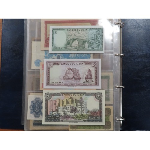 1203 - World (175), a collection in album including British West Africa, India, Malta,East African Currency... 