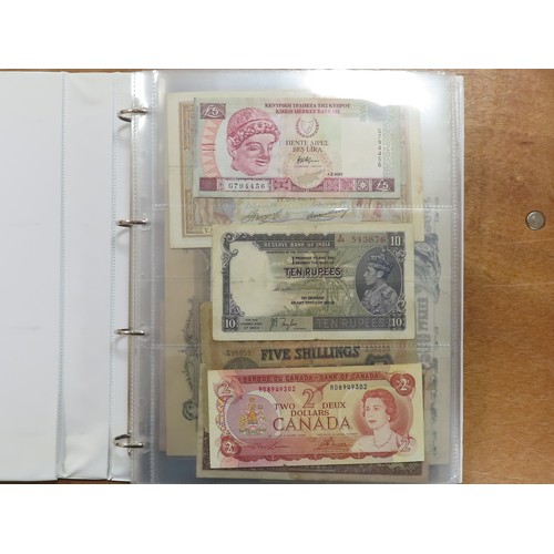 1206 - World (198), a collection in album including East African Currency Board, Tahiti, Malta, Egypt, Tuni... 