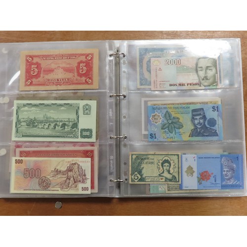 1206 - World (198), a collection in album including East African Currency Board, Tahiti, Malta, Egypt, Tuni... 