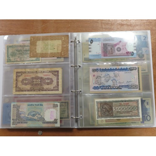 1206 - World (198), a collection in album including East African Currency Board, Tahiti, Malta, Egypt, Tuni... 