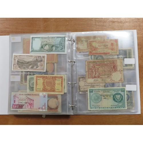 1206 - World (198), a collection in album including East African Currency Board, Tahiti, Malta, Egypt, Tuni... 