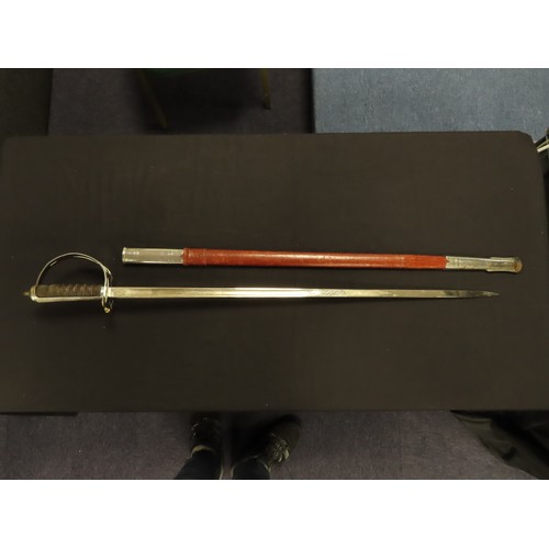 124 - Indian Army Officers sword complete with scabbard