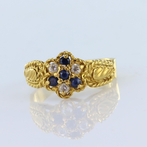 122 - 22ct yellow gold cluster ring featuring four approx. 2mm round sapphires and three approx. 2mm round... 