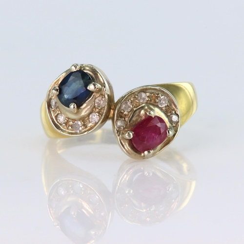 137 - 18ct yellow gold crossover style ring, one side set with an oval ruby and the other with an oval sap... 